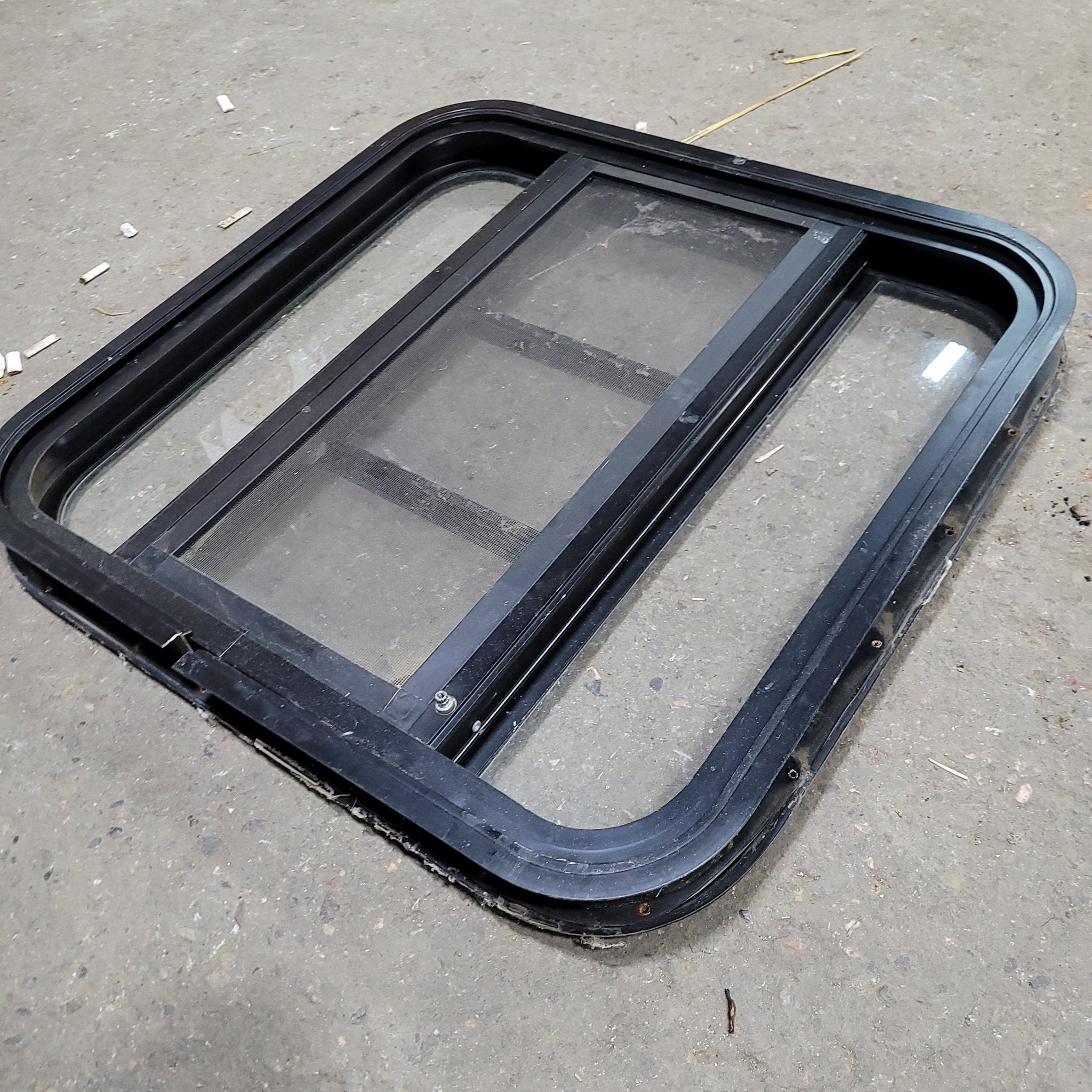 Used Black Radius Opening Window : 23 3/4" X 22 1/2" X 2" D - Young Farts RV Parts