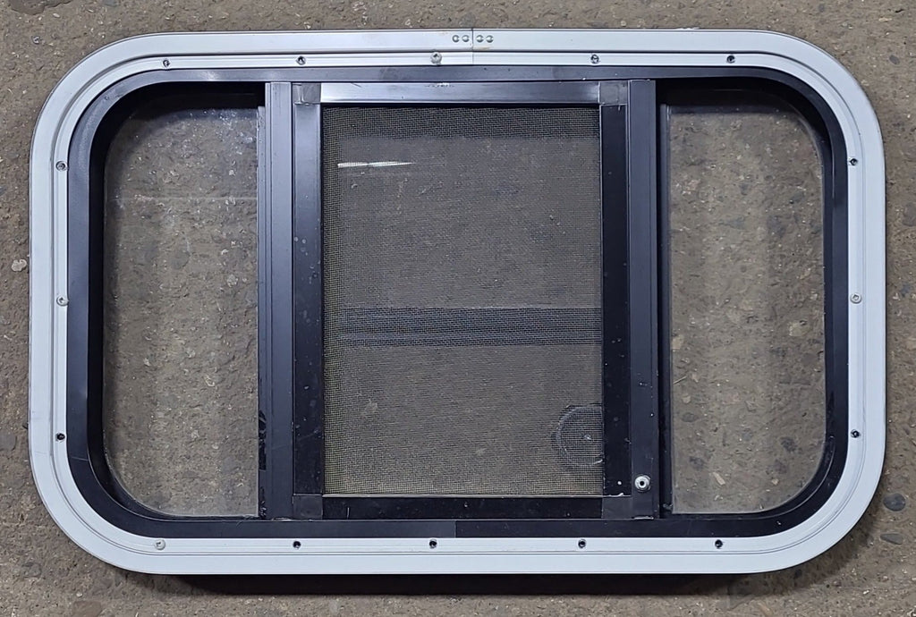 Used Black Radius Opening Window : 23 3/8" W x 14 3/8" H x 1 3/4" D - Young Farts RV Parts