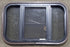 Used Black Radius Opening Window : 24 3/4" W x 16" H x 1 5/8" D - Young Farts RV Parts