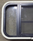 Used Black Radius Opening Window : 24 3/4" W x 16" H x 1 5/8" D - Young Farts RV Parts