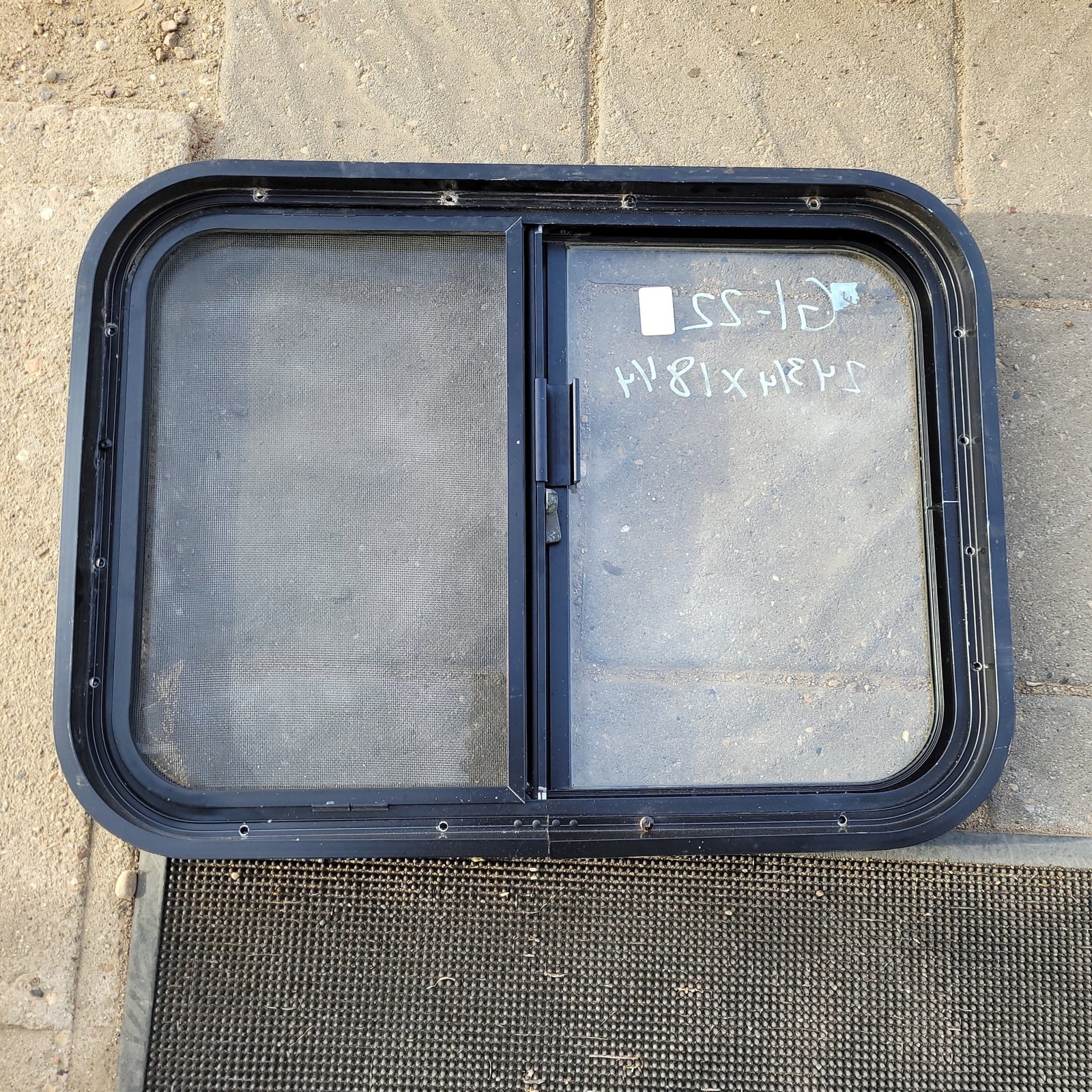 Used Black Radius Opening Window : 24 3/4 X 18 1/4 X 2