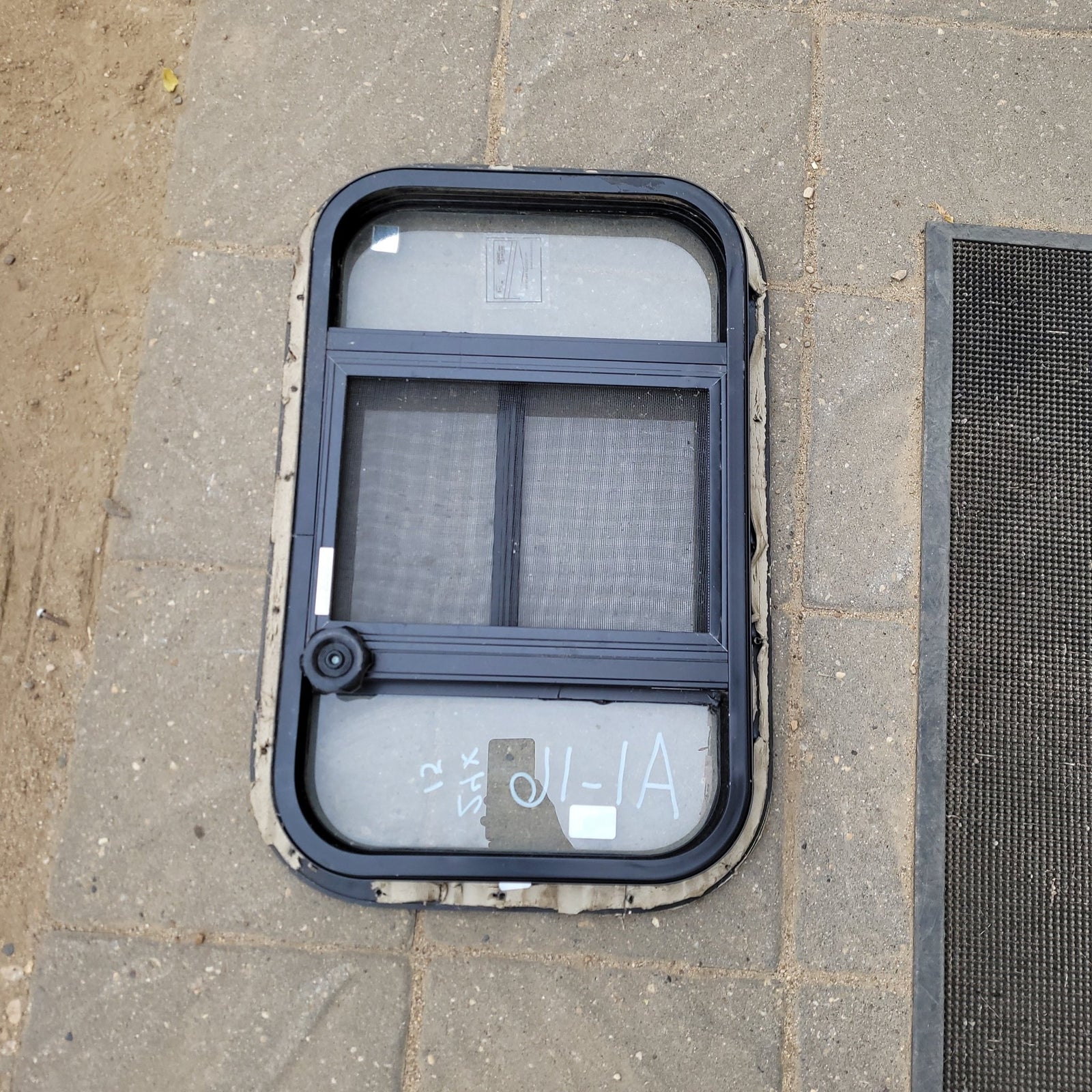 Used Black Radius Opening Window : 24 X 15 X 2