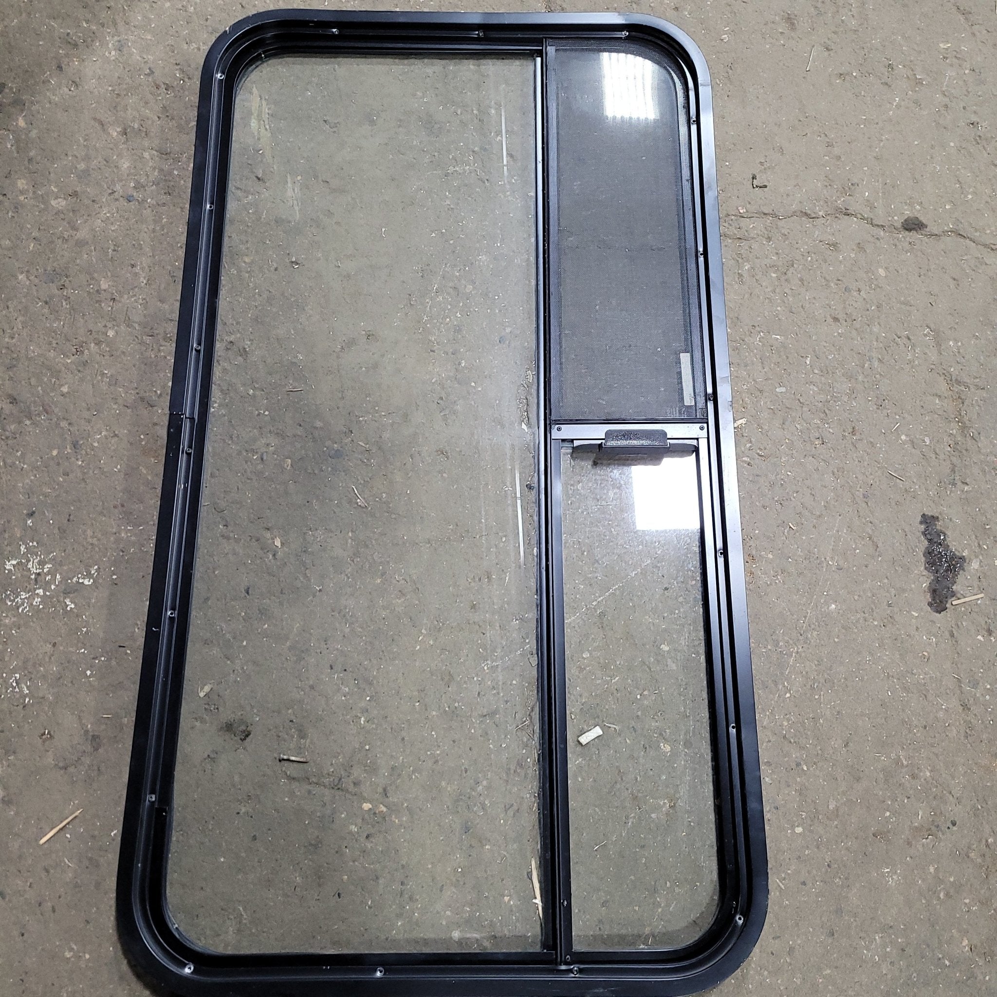 Used Black Radius Opening Window : 25 3/4" X 47 3/4" X 2" D - Young Farts RV Parts