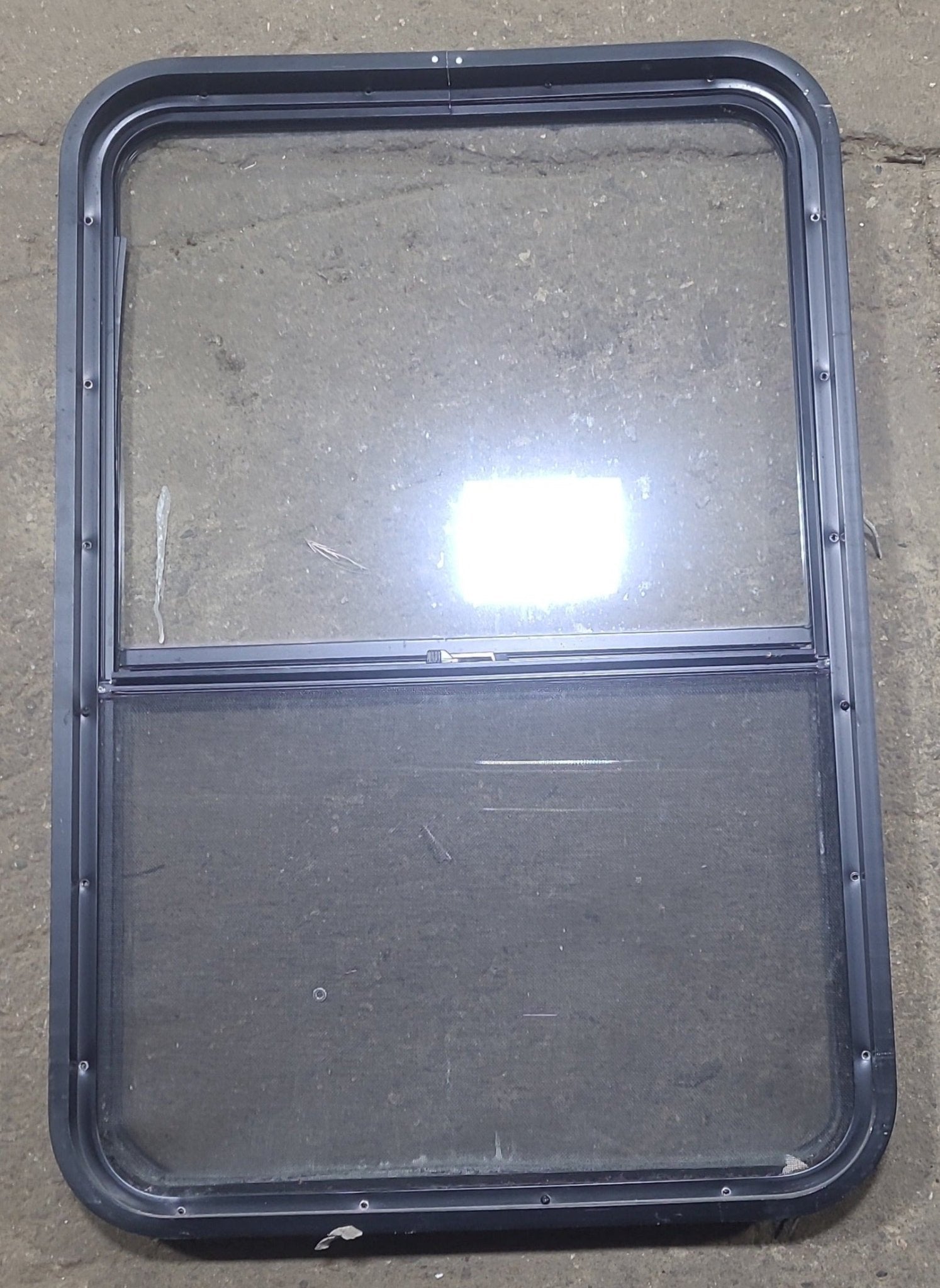 Used Black Radius Opening Window : 26 1/2" W x 39 3/4" H x 1 7/8" D - Young Farts RV Parts