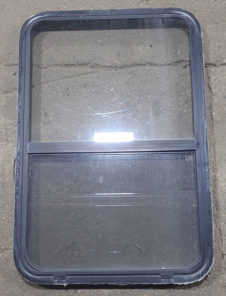 Used Black Radius Opening Window : 26 1/2" W x 39 3/4" H x 1 7/8" D - Young Farts RV Parts