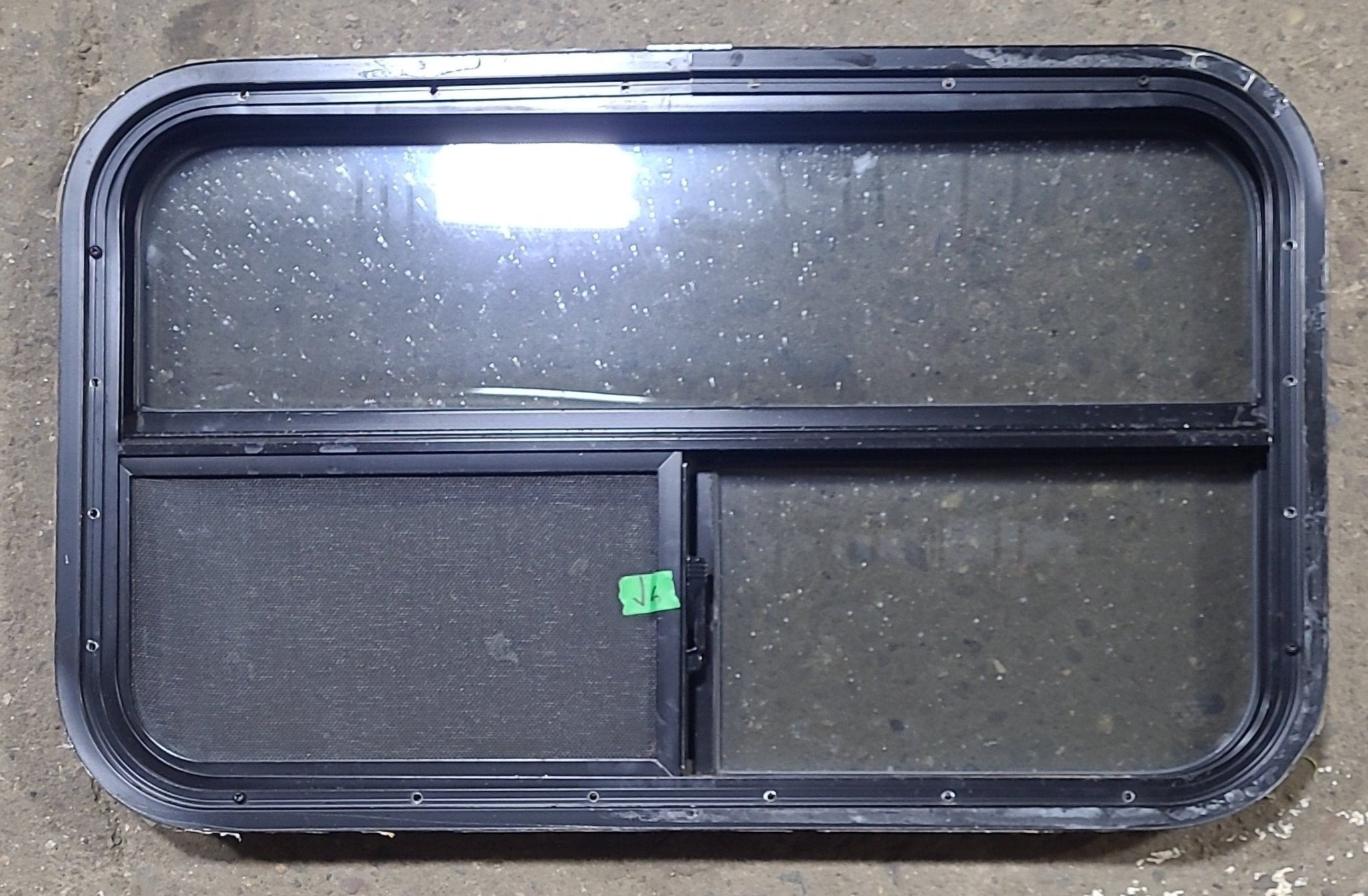 Used Black Radius Opening Window : 29 1/2" W x 17 1/2" H x 1 7/8" D - Young Farts RV Parts