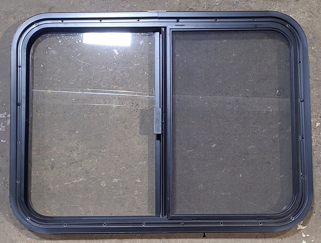 Used Black Radius Opening Window : 29 1/2" W x 21 1/2" H x 1 1/4" D - Young Farts RV Parts
