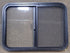 Used Black Radius Opening Window : 29 1/2" W x 21 1/2" H x 1 1/4" D - Young Farts RV Parts