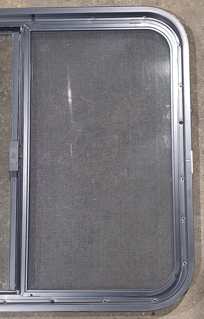 Used Black Radius Opening Window : 29 1/2" W x 25 1/2" H x 1 3/4" D - Young Farts RV Parts
