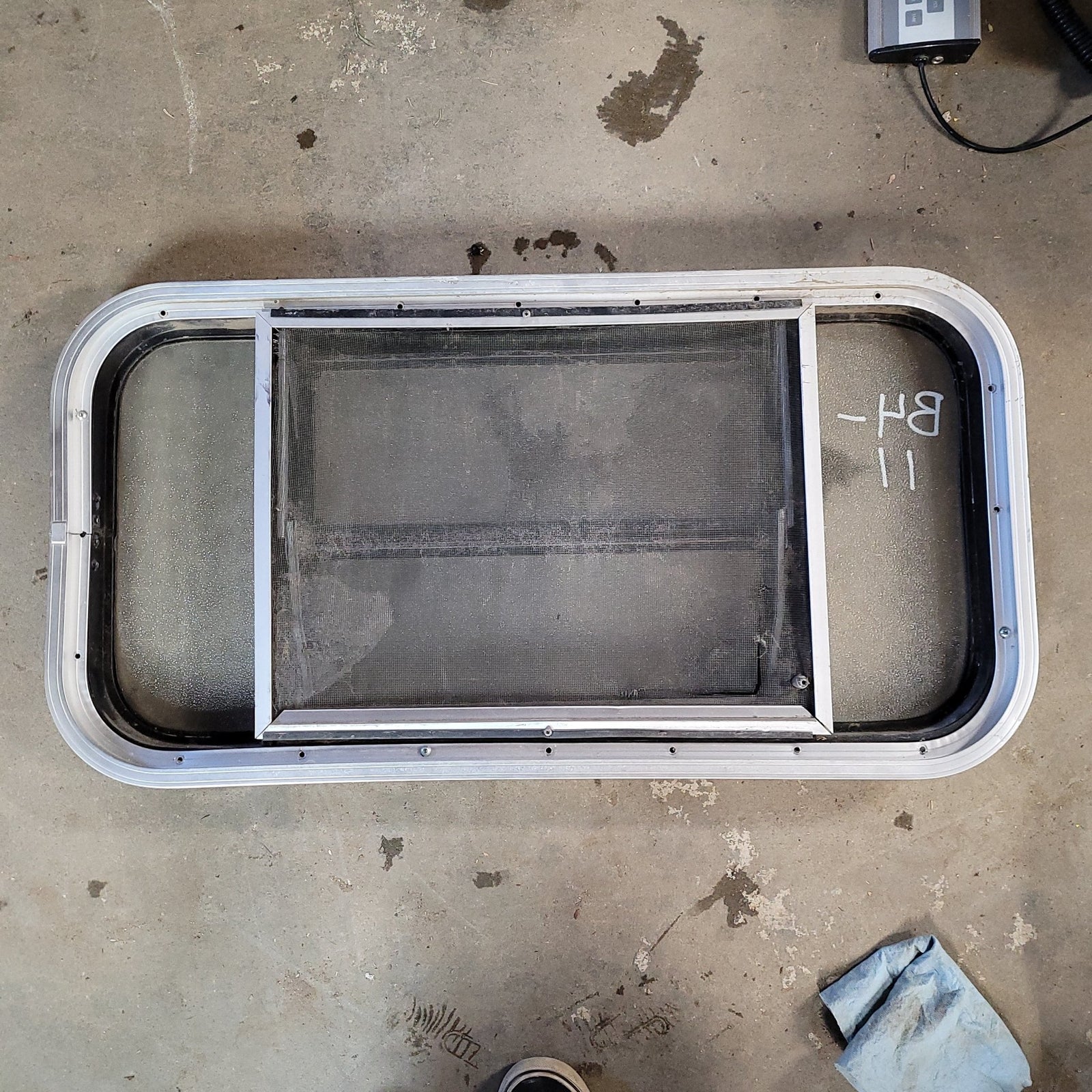 Used Black Radius Opening Window : 30 1/2 X 15 7/8 X 2