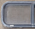 Used Black Radius Opening Window : 30 1/4" W x 11 3/4" H x 1 3/4" D - Young Farts RV Parts