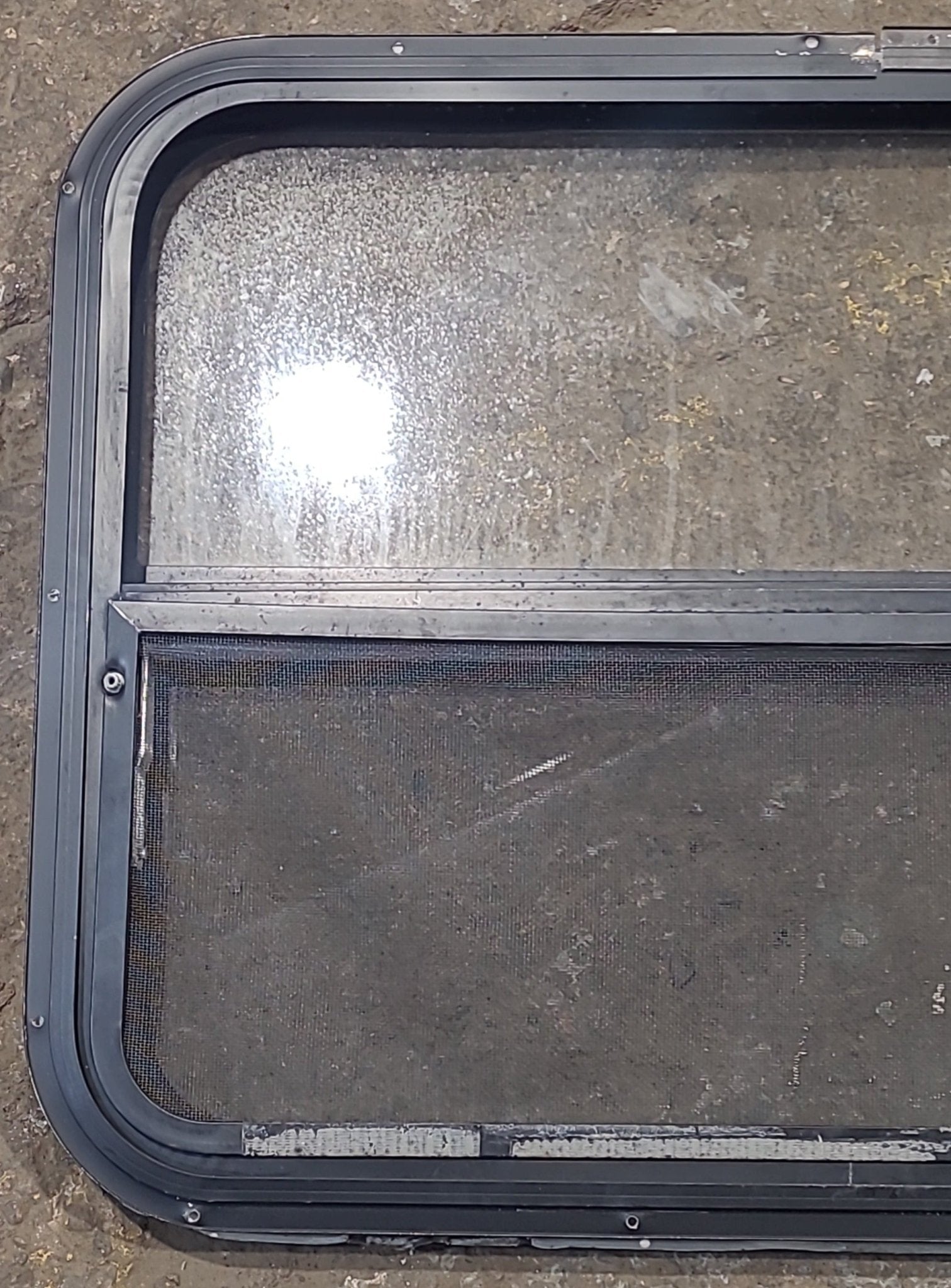 Used Black Radius Opening Window : 30 1/4" W x 22 1/4" H x 1 1/4" D - Young Farts RV Parts