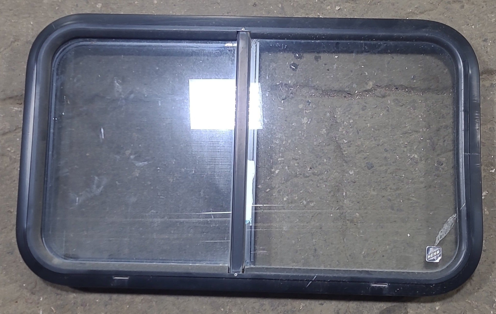 Used Black Radius Opening Window : 30 3/8" W x 18" H x 1 5/8" D - Young Farts RV Parts