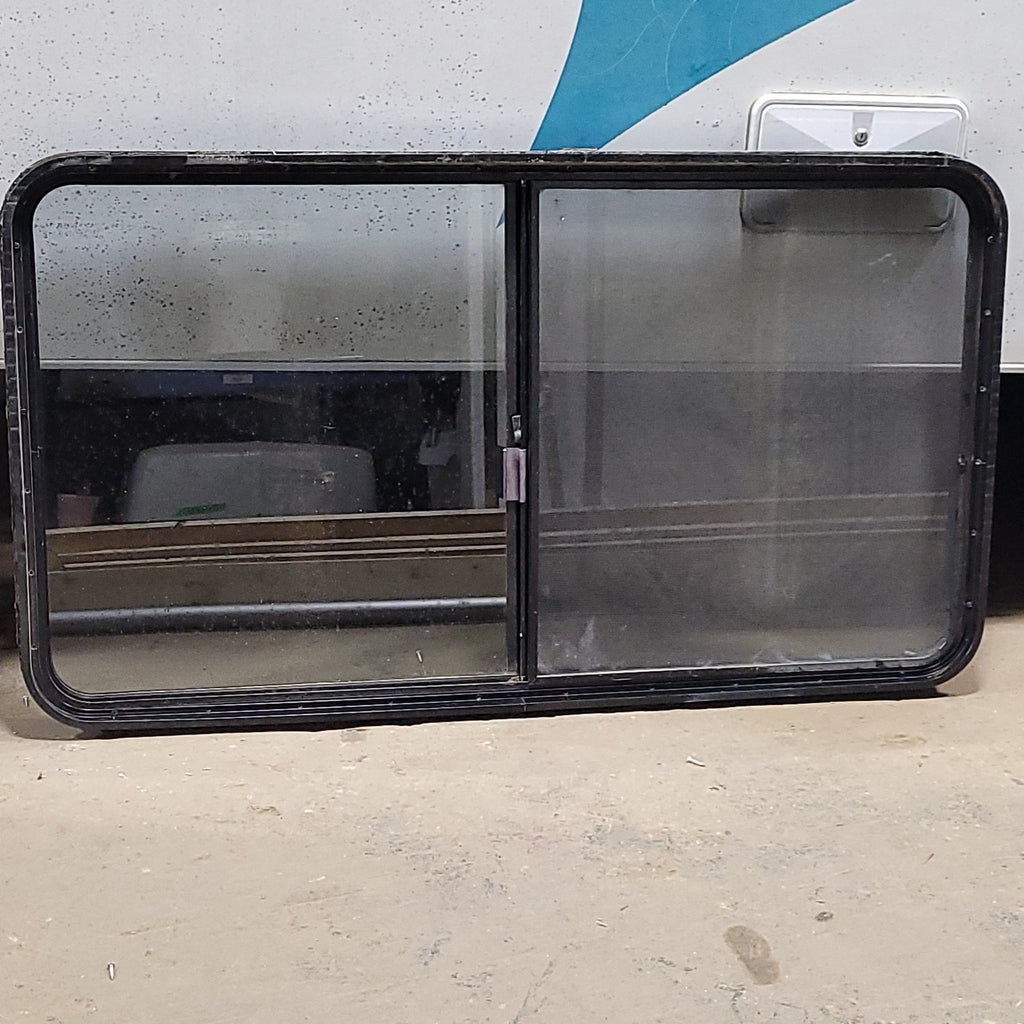 Used Black Radius Opening Window : 30" X 54 1/2" X 2" D - Young Farts RV Parts