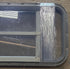 Used Black Radius Opening Window : 31 3/4" W x 16 1/2" H x 1 7/8" D - Young Farts RV Parts