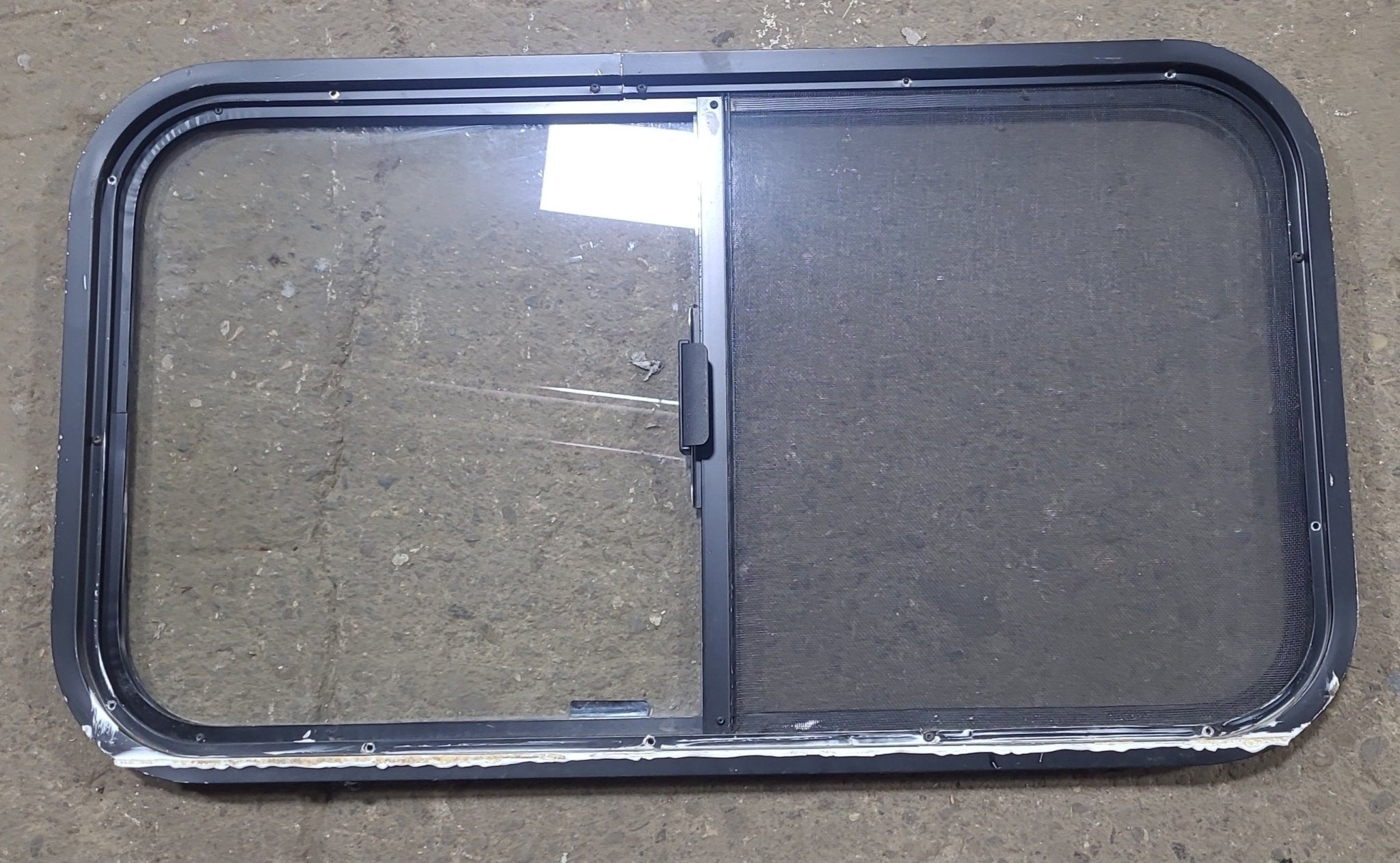 Used Black Radius Opening Window : 35 1/2" W x 19 3/4" H x 1 1/2" D - Young Farts RV Parts