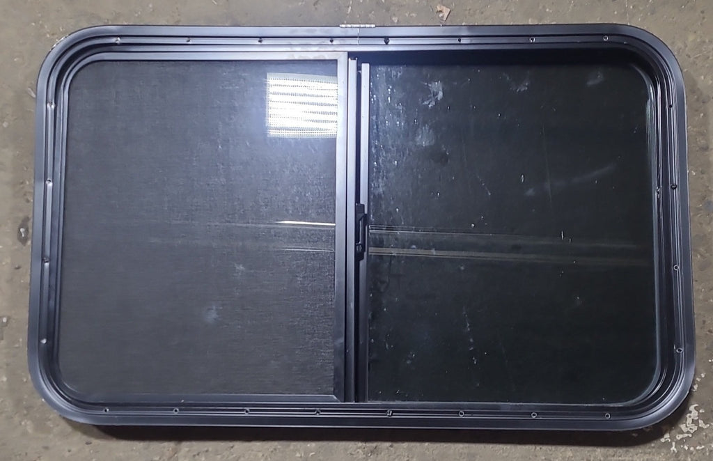 Used Black Radius Opening Window : 35 1/2" W x 21 1/2" H x 1 5/8" D - Young Farts RV Parts