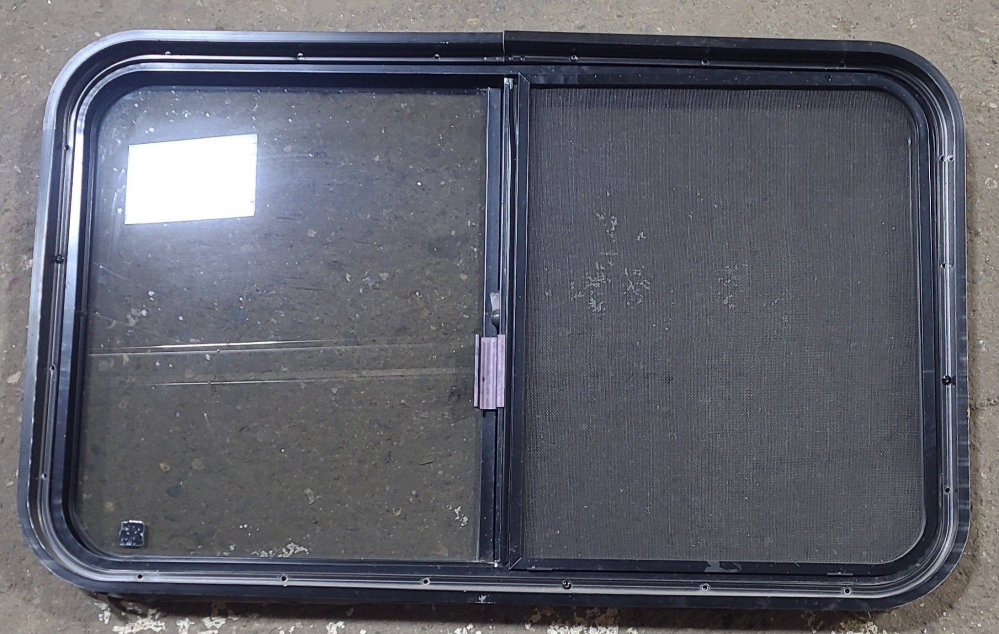 Used Black Radius Opening Window : 36 1/4" W x 22" H x 1 3/4" D - Young Farts RV Parts