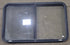 Used Black Radius Opening Window : 42 1/2" W x 26" H x 2" D - Young Farts RV Parts