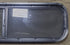 Used Black Radius Opening Window : 42 1/4" W x 11 3/4" H x 1 7/8" D - Young Farts RV Parts