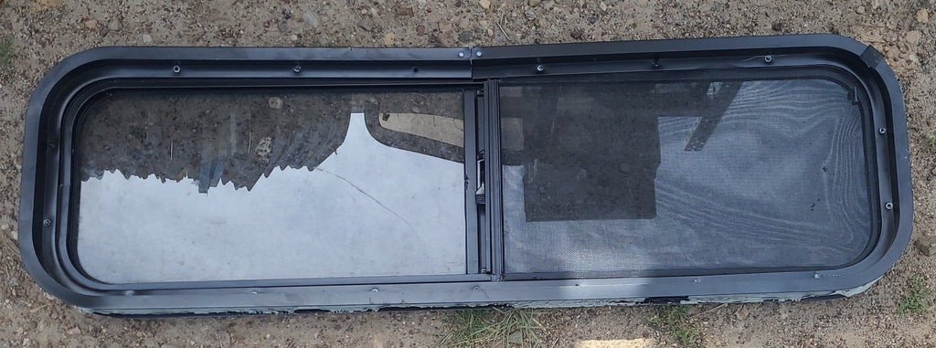 Used Black Radius Opening Window : 42 1/4" W x 11 3/4" H x 1 7/8" D - Young Farts RV Parts