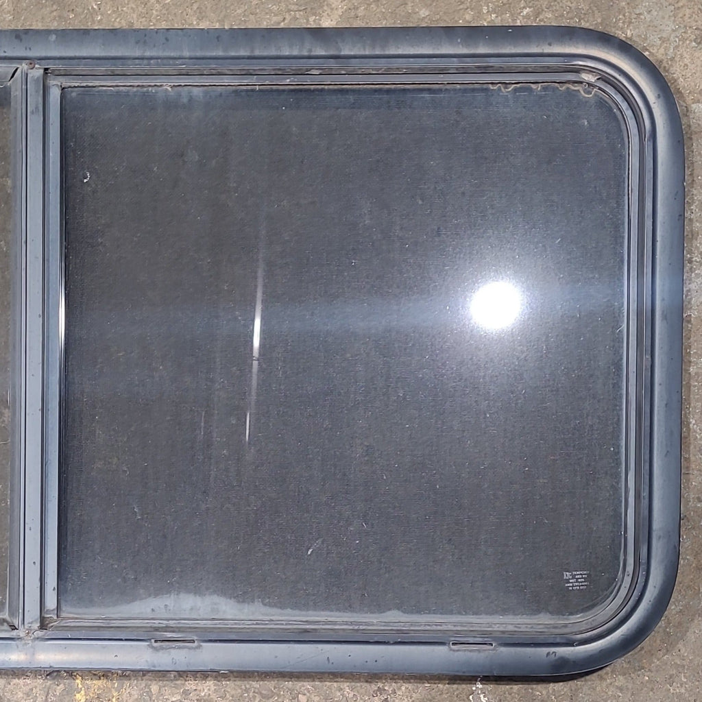 Used Black Radius Opening Window : 45 1/2" W x 21 1/2" H x 1 3/4" D - Young Farts RV Parts