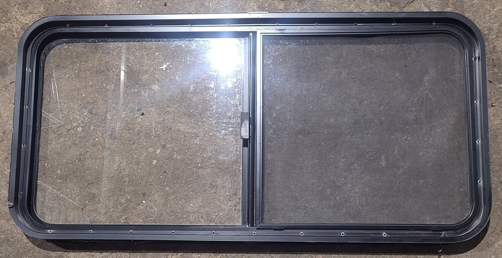 Used Black Radius Opening Window : 45 1/2" W x 21 1/2" H x 1 7/8" D - Young Farts RV Parts