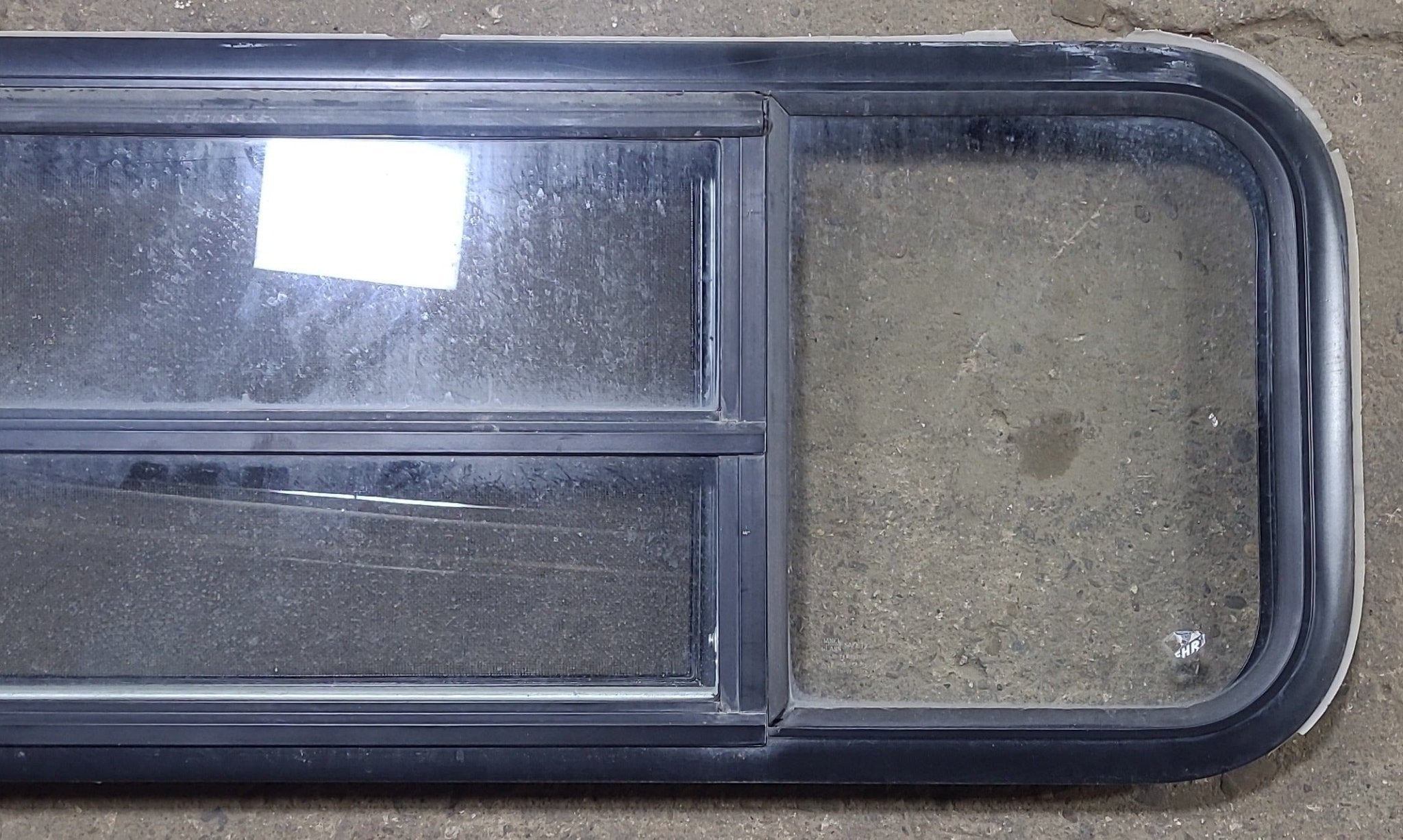 Used Black Radius Opening Window : 47 1/2" W x 14 3/4" H x 1 5/8" D - Young Farts RV Parts