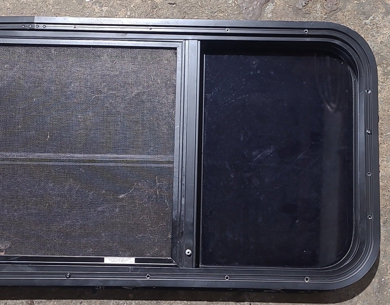 Used Black Radius Opening Window : 47 1/2