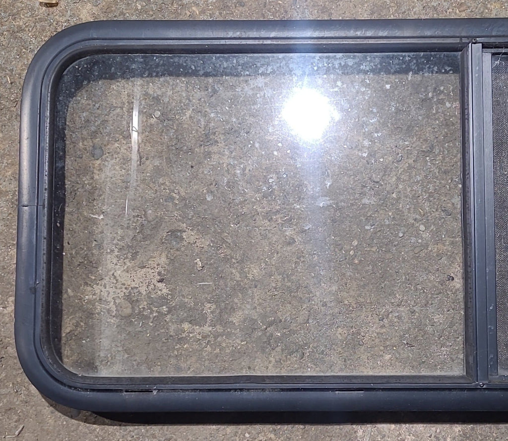 Used Black Radius Opening Window : 47 1/2" W x 19 1/2" H x 1 3/4" D - Young Farts RV Parts