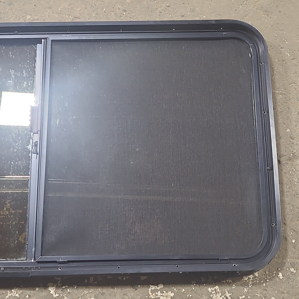 Used Black Radius Opening Window : 48 1/2" W x 261/4" H x 1 3/4" D - Young Farts RV Parts