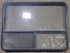 Used Black Radius Opening Window : 48 1/4" W x 35 3/4" H x 1 3/4" D - Young Farts RV Parts