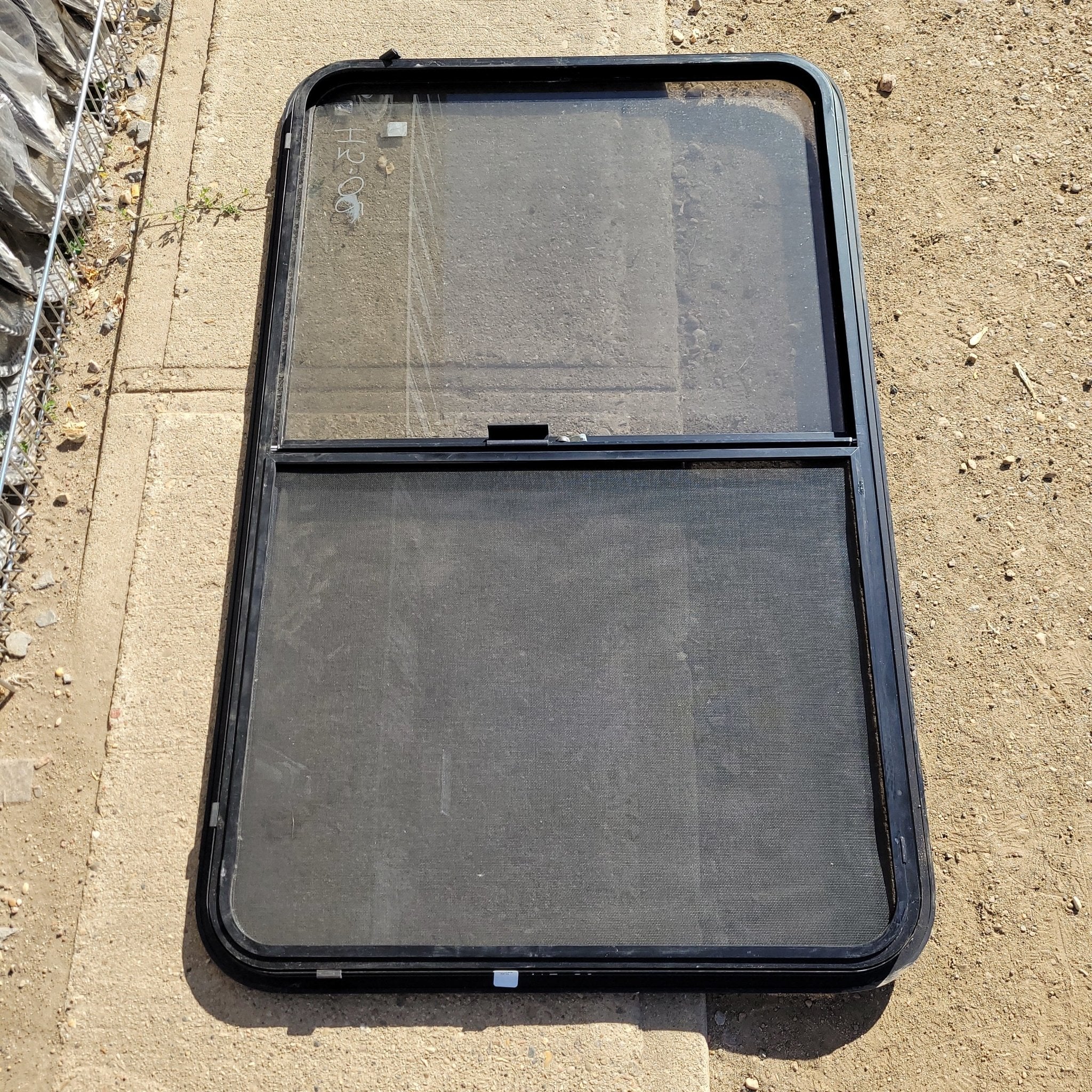 Used Black Radius Opening Window : 48 1/4 X 30 X 1 1/2" D - Young Farts RV Parts