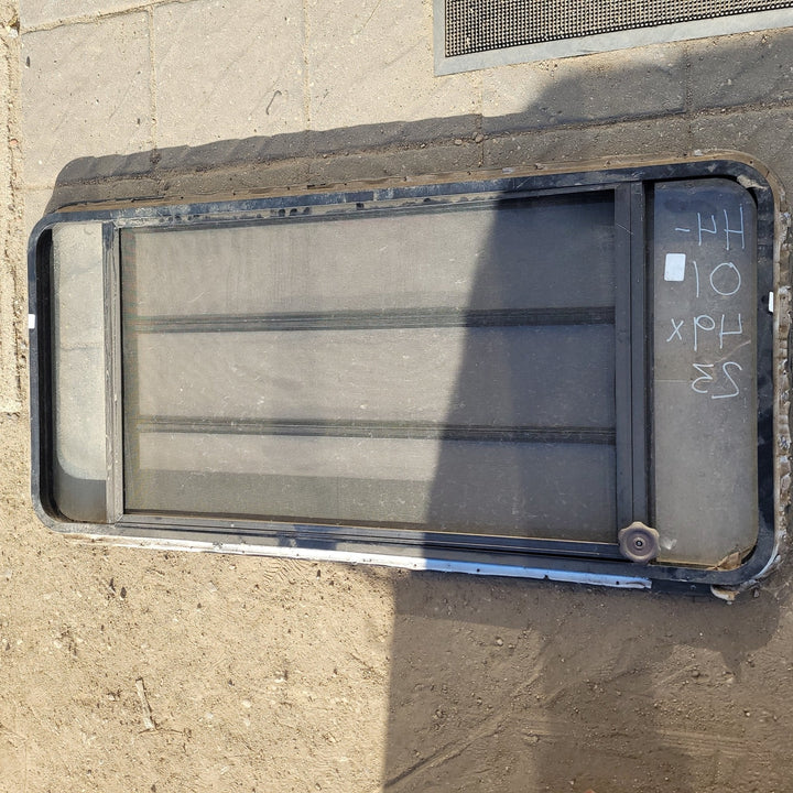 Used Black Radius Opening Window : 49 X 23 X 2" D - Young Farts RV Parts