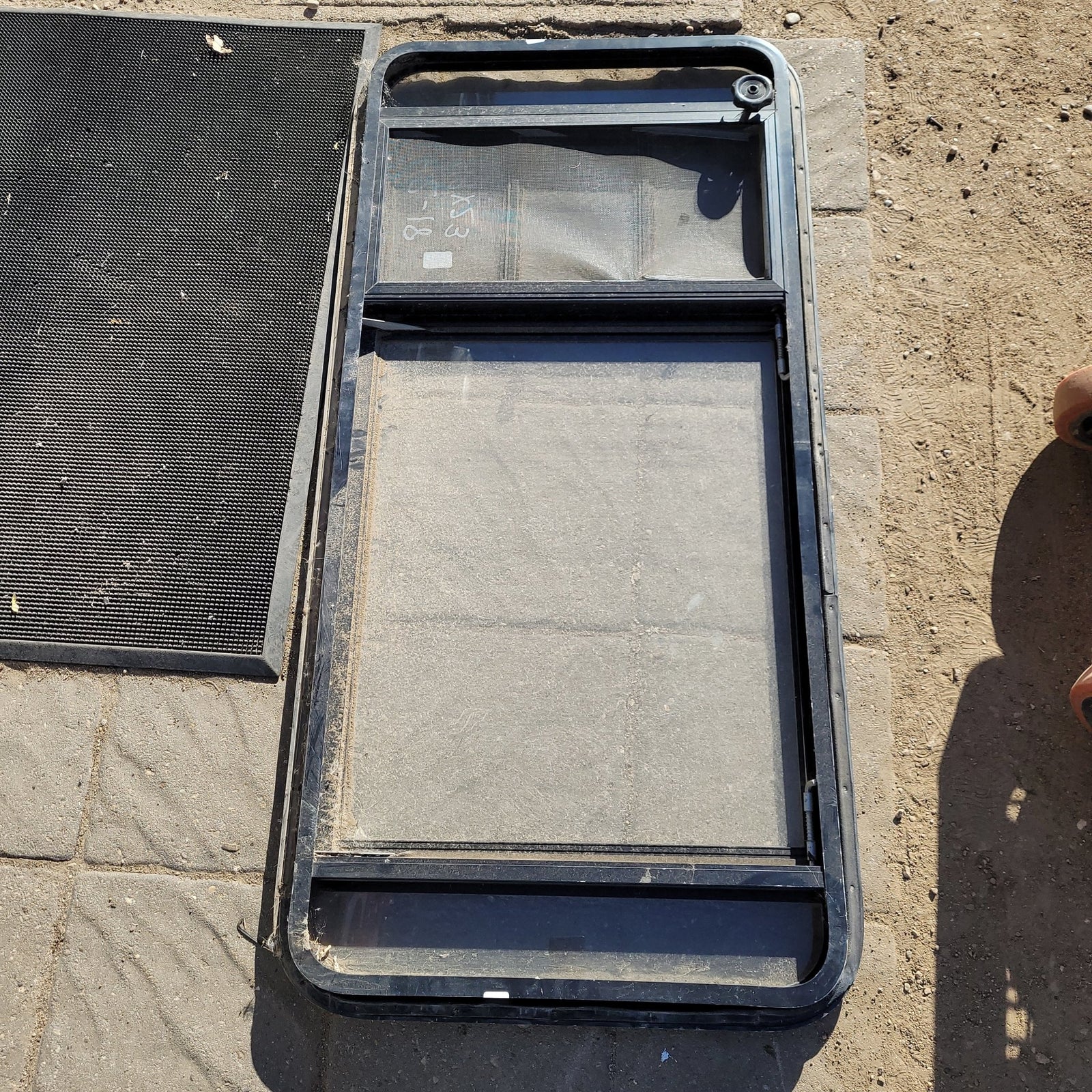 Used Black Radius Opening Window : 49 X 23 X 2