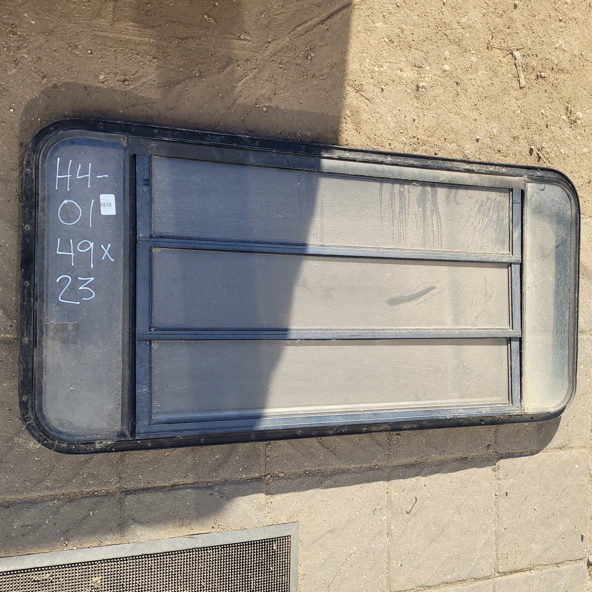 Used Black Radius Opening Window : 49 X 23 X 2" D - Young Farts RV Parts