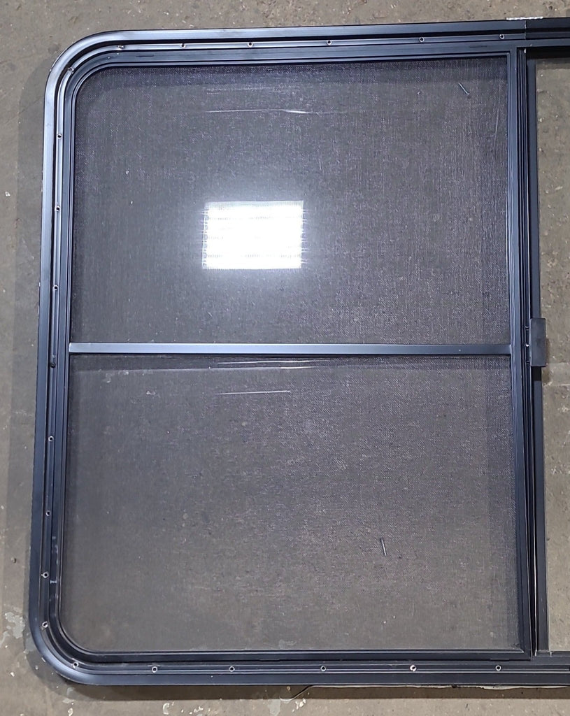 Used Black Radius Opening Window : 53 1/2" W x 35 1/2" H x 1 1/4" D - Young Farts RV Parts