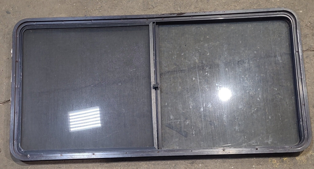 Used Black Radius Opening Window : 57" W x 27 3/4" H x 1 7/8" D - Young Farts RV Parts