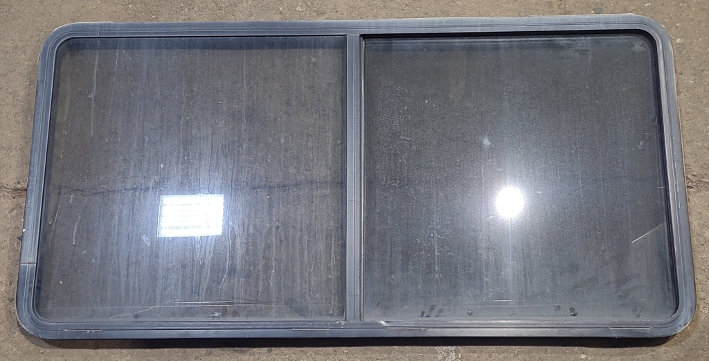 Used Black Radius Opening Window : 57" W x 27 3/4" H x 1 7/8" D - Young Farts RV Parts