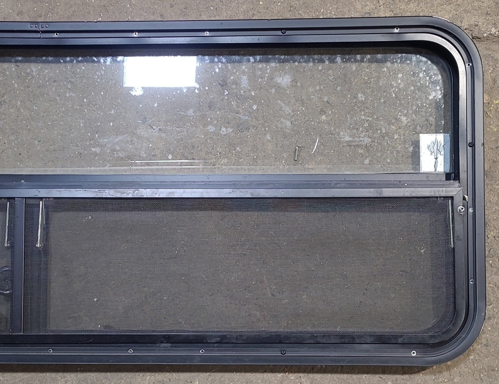 Used Black Radius Opening Window : 59 1/4" W x 21 1/4" H x 1 7/8" D - Young Farts RV Parts
