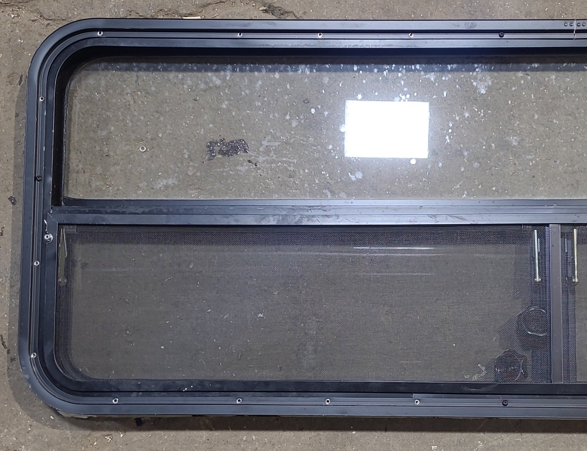 Used Black Radius Opening Window : 59 1/4" W x 21 1/4" H x 1 7/8" D - Young Farts RV Parts