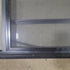 Used Black Radius Opening Window : 71 1/4" W x 21 1/2" H x 1 1/2" D - Young Farts RV Parts