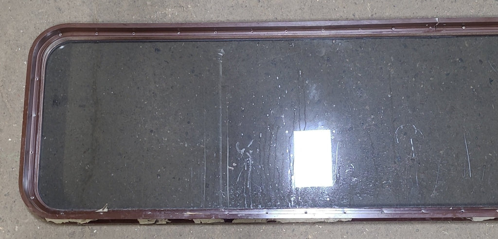 Used Brown Radius Non-Opening Window : 60 1/4" W X 20" H X 2" D - Young Farts RV Parts