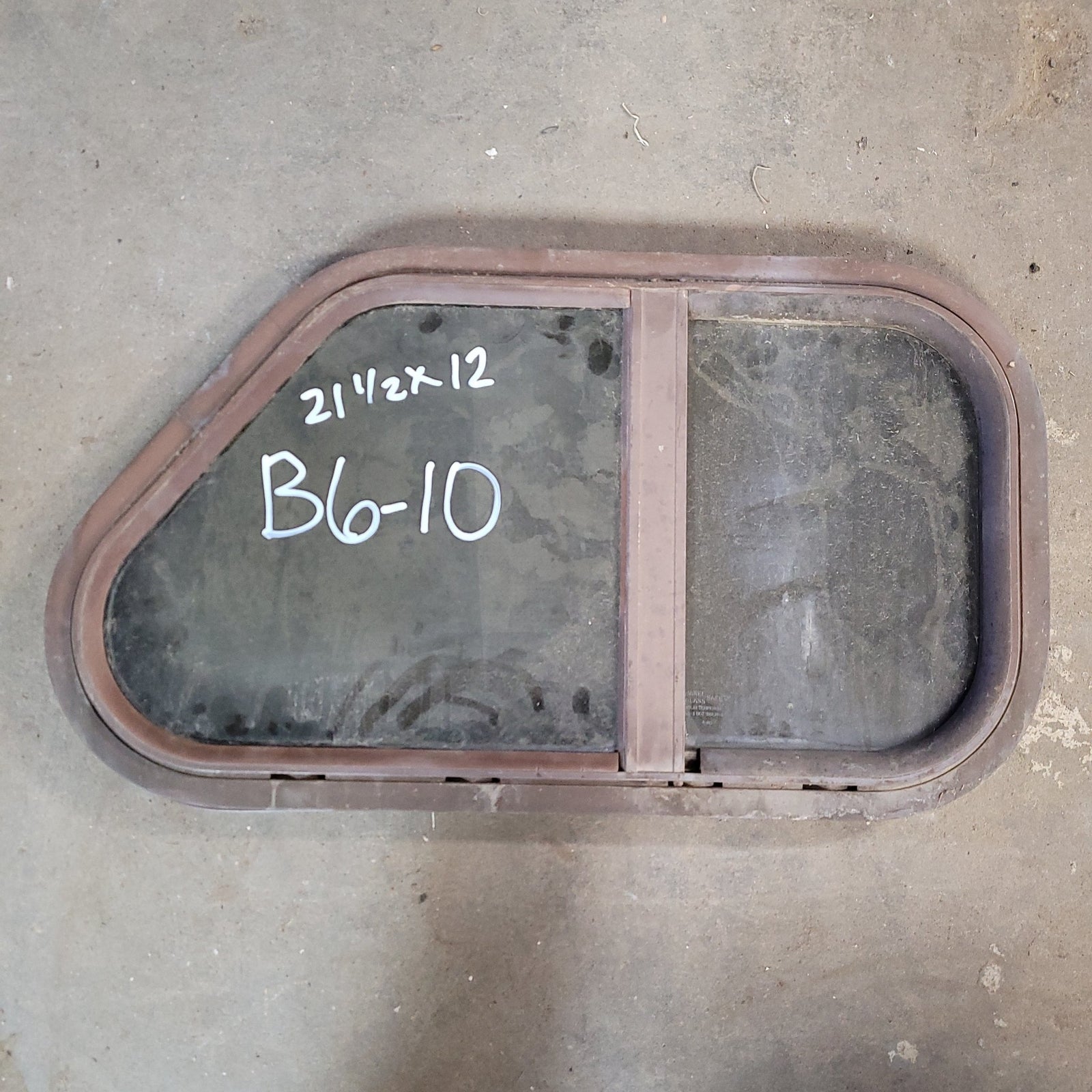 Used Brown Radius Slanted Opening Window : 21 1/2 X 12 X 2