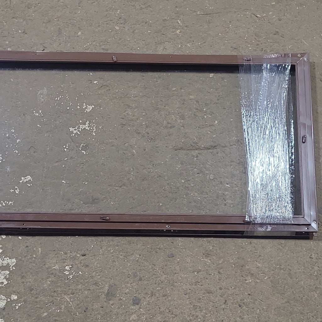 Used Brown Square Non Opening Window: 58 1/2" W x 19 1/4" H x 3/4" D - Young Farts RV Parts
