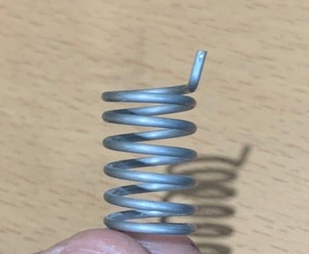 Used Dometic 2002237010 Freezer Spring RH - Young Farts RV Parts