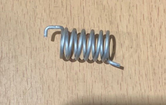 Used Dometic 2002237010 Freezer Spring RH - Young Farts RV Parts