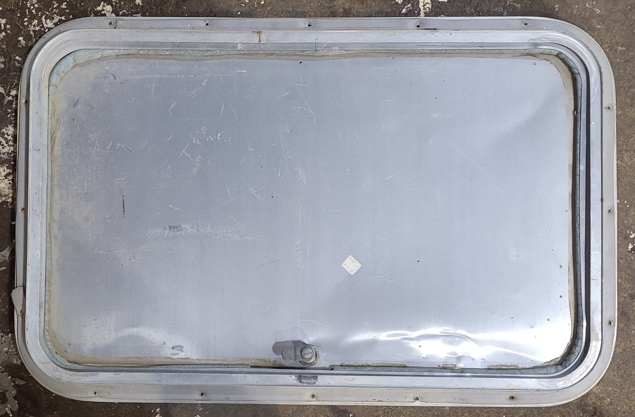 Used Radius Cornered Cargo Door 25 3/8" x 15 5/8" x 3/4" - Young Farts RV Parts