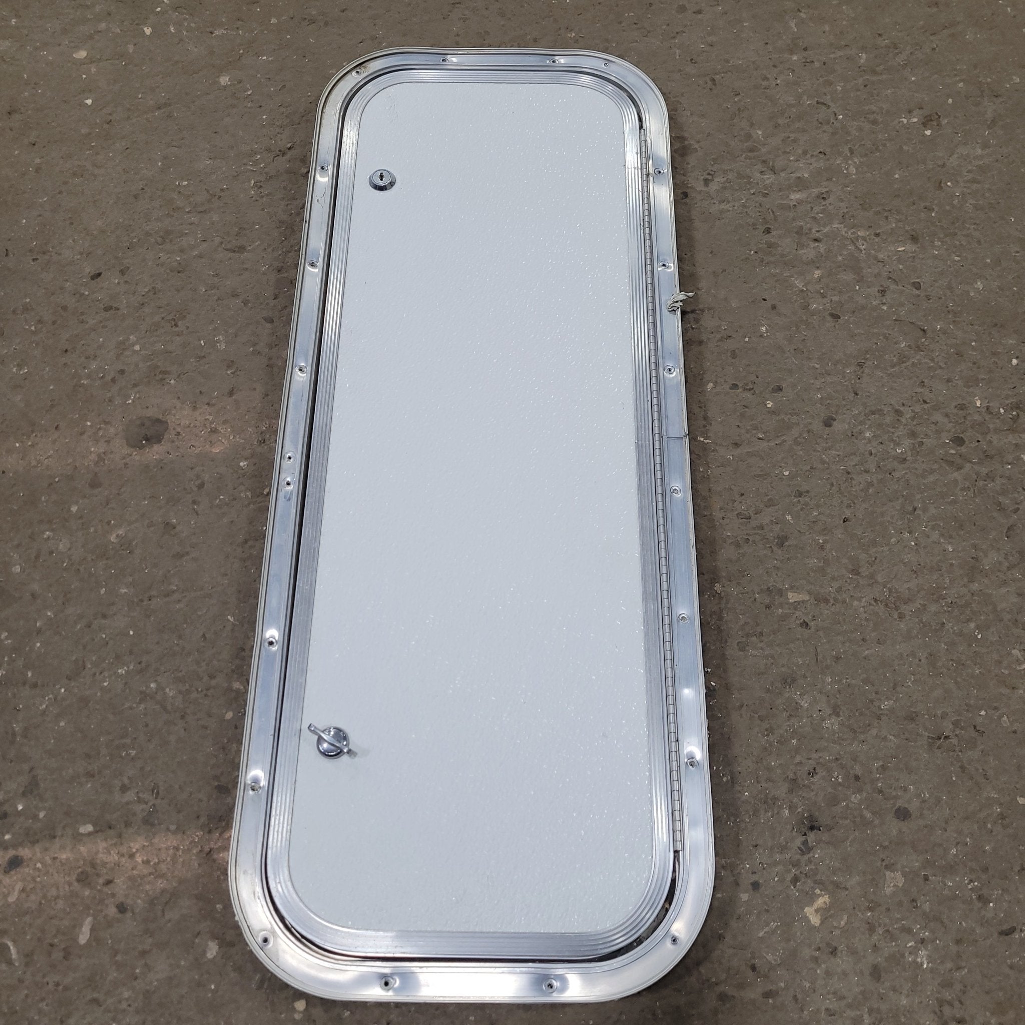 Used Radius Cornered Cargo Door 29 3/4" x 10 3/4" X 1/2" D - Young Farts RV Parts