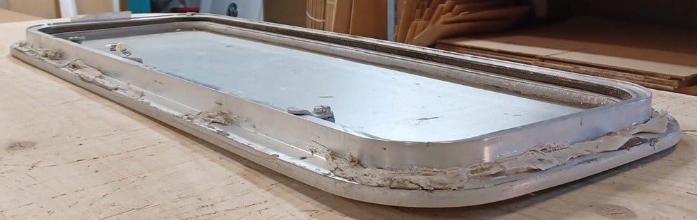 Used Radius Cornered Cargo Door 31 3/4" x 11 1/8" x 7/8"D - Young Farts RV Parts